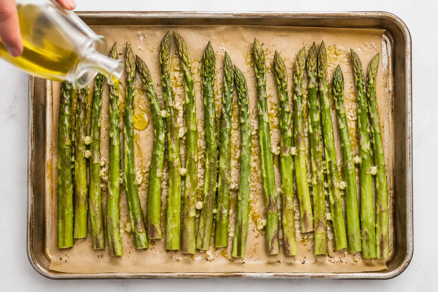 How to bake asparagus on a sheet pan with olive oil and garlic
