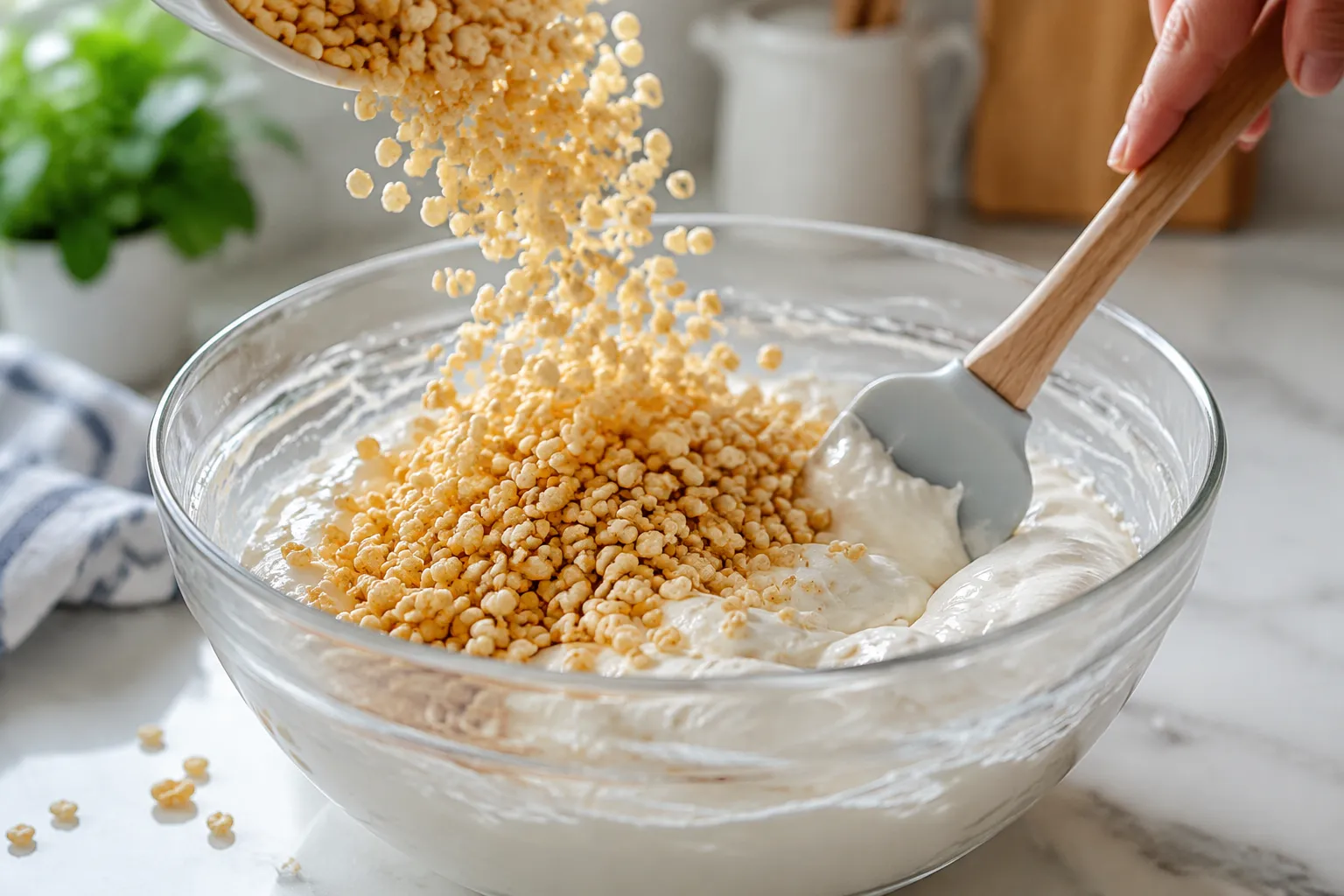 Folding cereal into marshmallow for rice krispie treat recipe