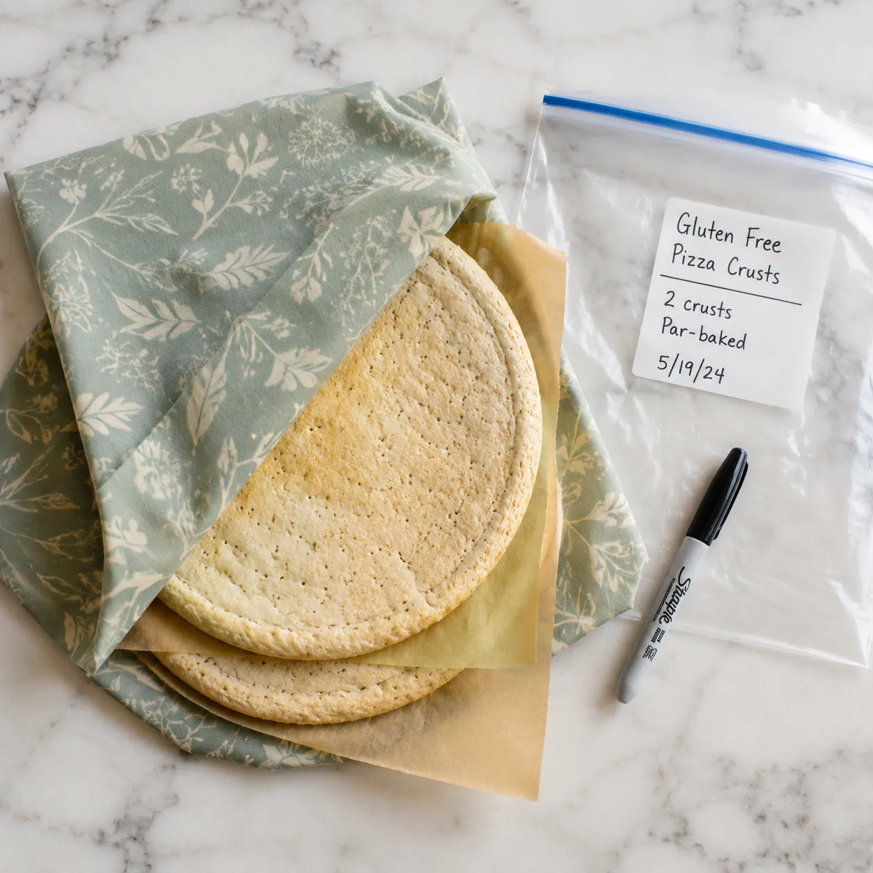 Storing par-baked gluten free pizza crusts for the freezer