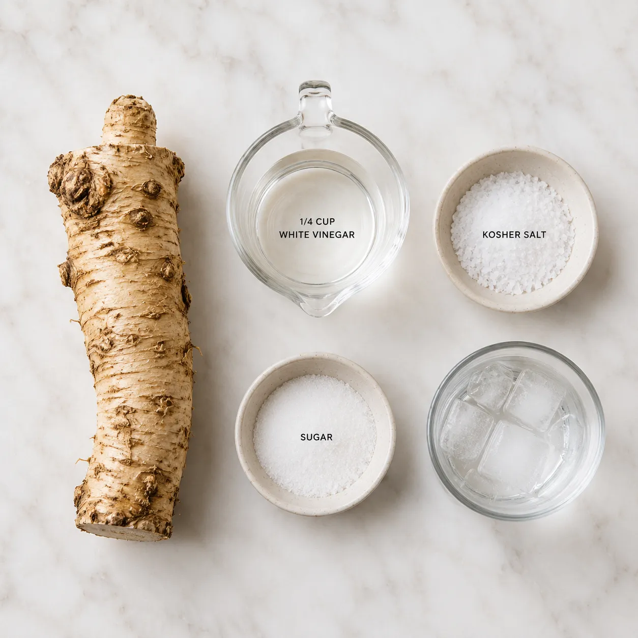 Prepared horseradish recipe ingredients flatlay with fresh root and vinegar