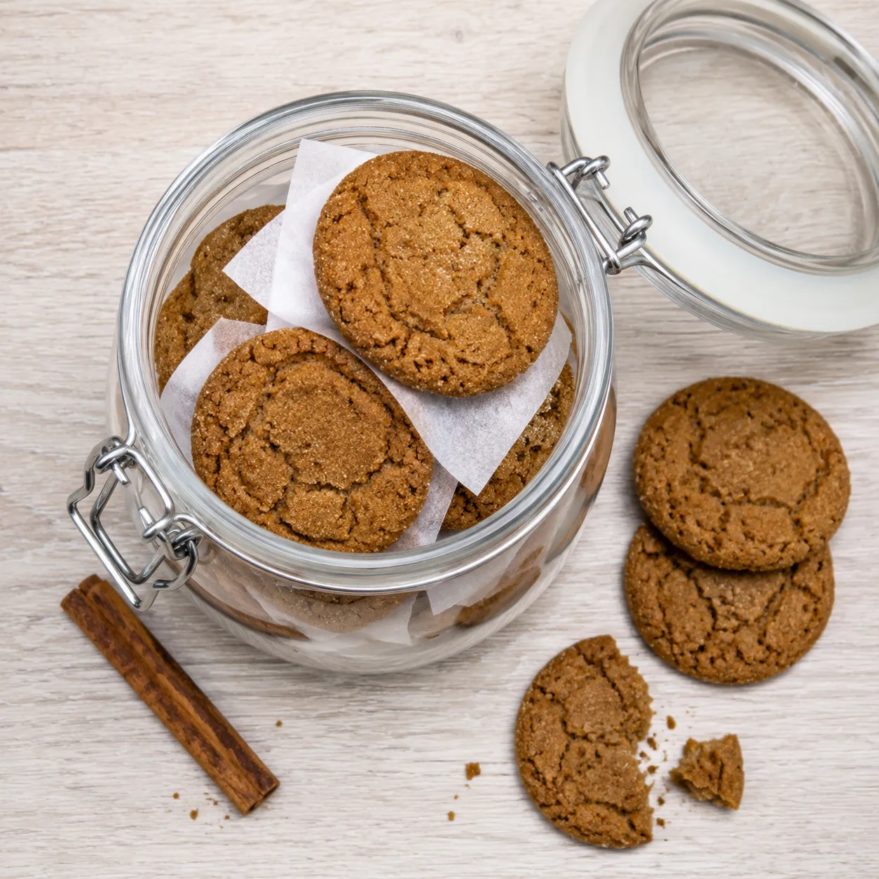 Storing ginger snap cookies in an airtight glass jar to keep them crisp.