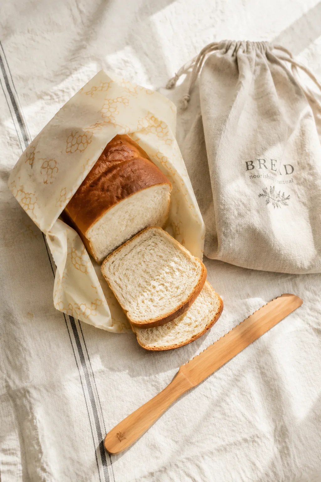 Storing homemade milk bread sliced and wrapped for freshness