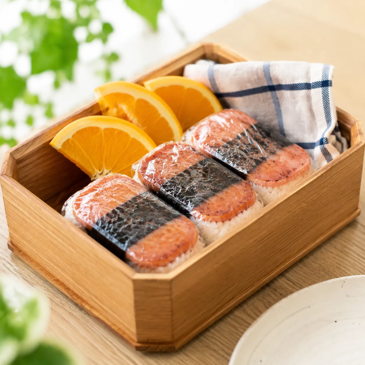 Spam musubi recipe wrapped for lunchbox meal prep storage