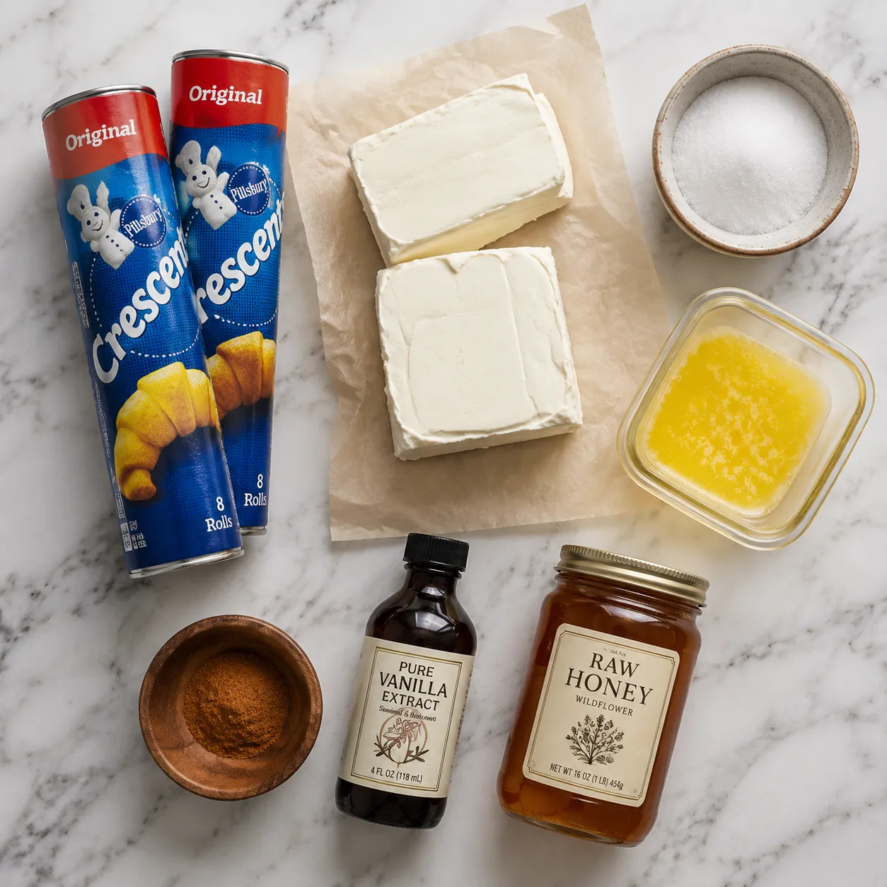 Sopapilla cheesecake ingredients flatlay with cream cheese and crescent dough