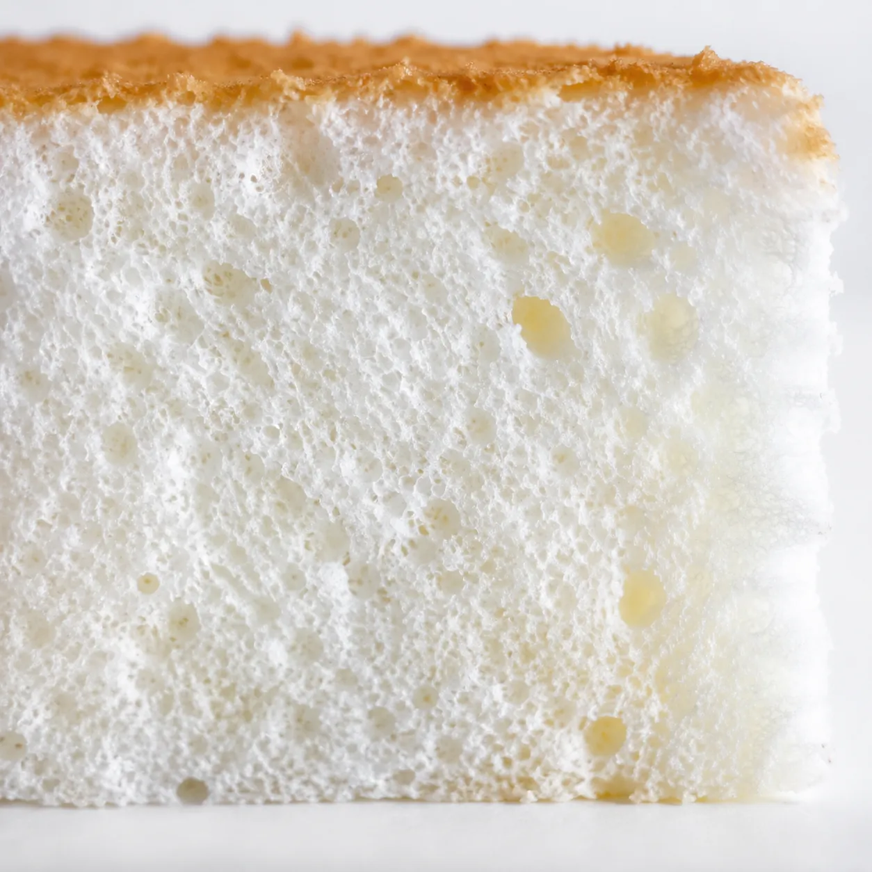 Close-up of fluffy angel food cake crumb texture