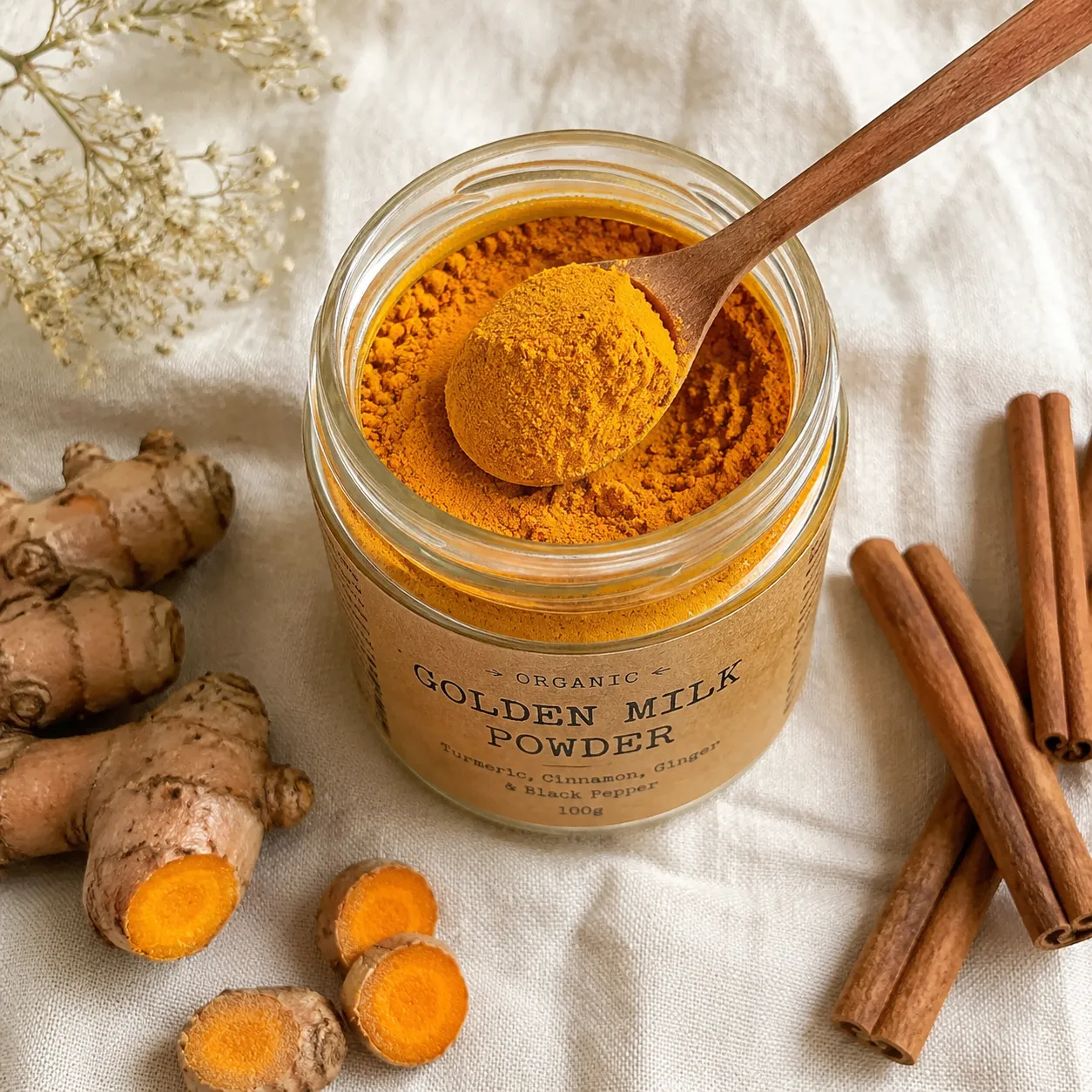 Homemade golden milk powder mix in glass jar