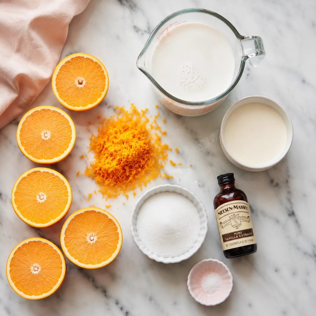 Sherbet ice cream ingredients flatlay with fresh oranges and dairy